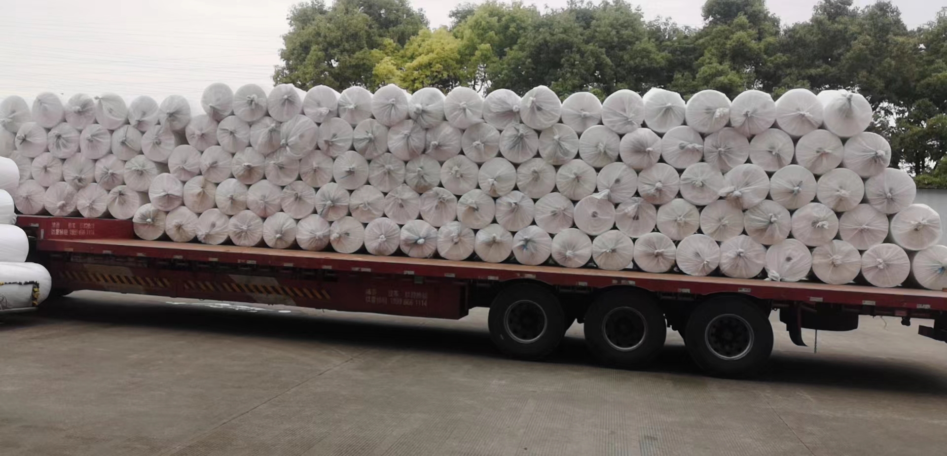 Finished film rolls loaded for outbound shipping
